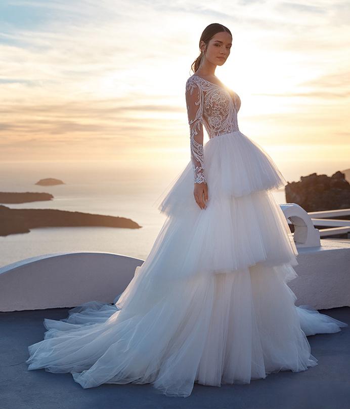 Vestidos de novia con volantes y mangas largas para la boda