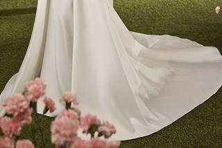 Trajes de novia manga larga con sobrefalda con cola