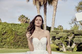 Vestido de novia con escote corazón y volantes para el día de la boda