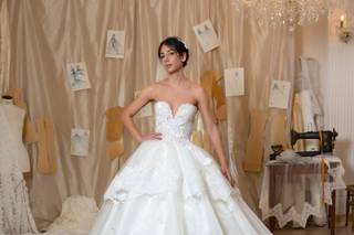 Vestido de novia con escote corazón y corte princesa con volantes para el día de la boda