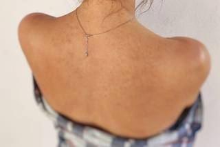 Peinados para bodas: moño con trenza estilizado