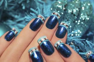 Uñas de Navidad azules brillantes