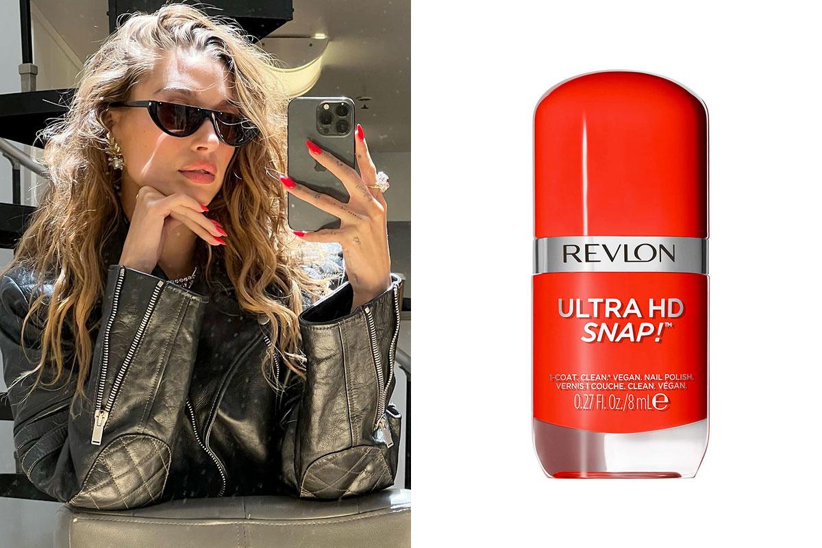 Hailey Bieber con gafas de sol y cazadora de cuero con uñas largas rojo flúor