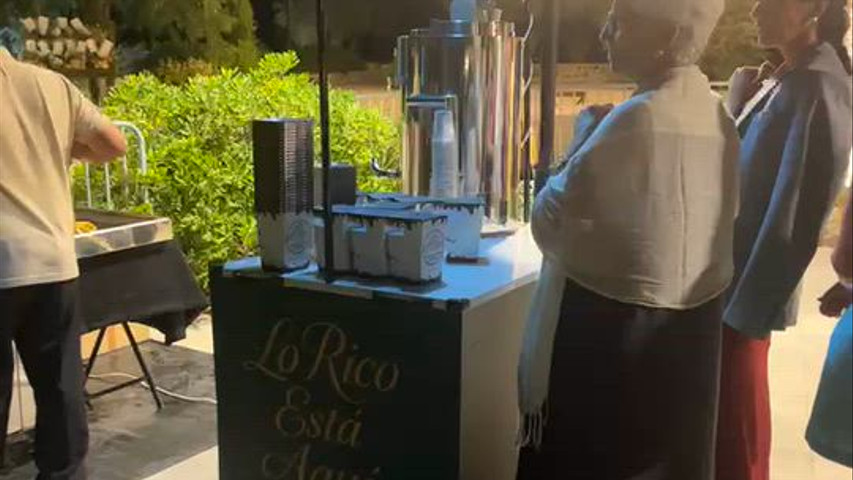 Carrito de churros con chocolate