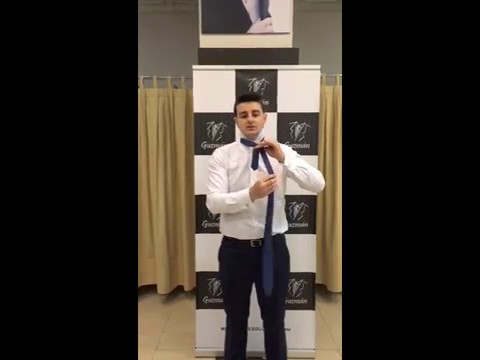 Cómo hacer un nudo de corbata doble