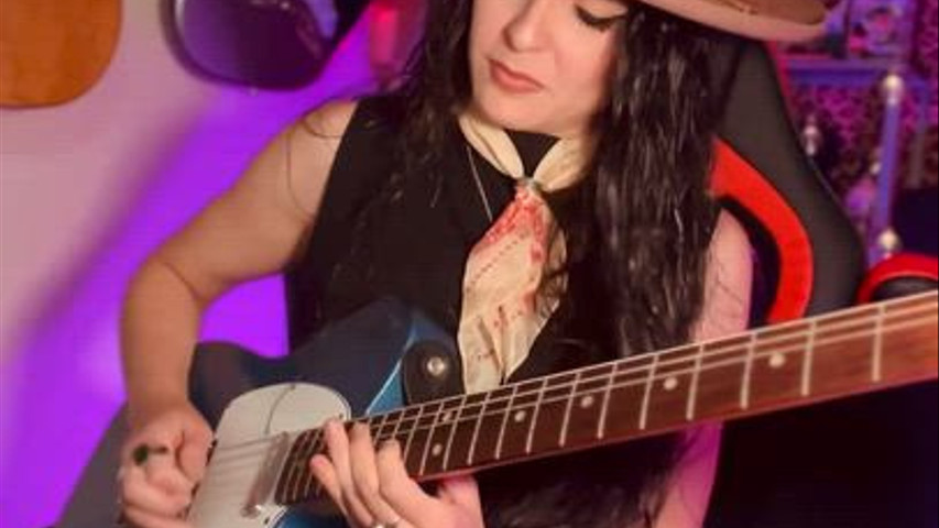 Vicky Oliveros Guitarrista 