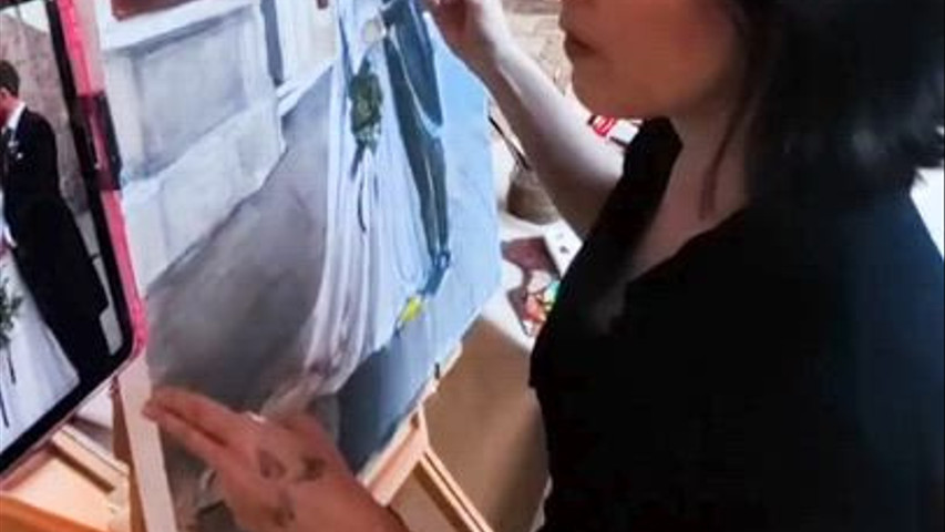 Retrato en vivo de los novios