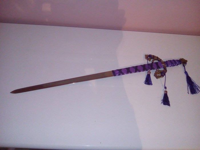 Espada para partir la tarta