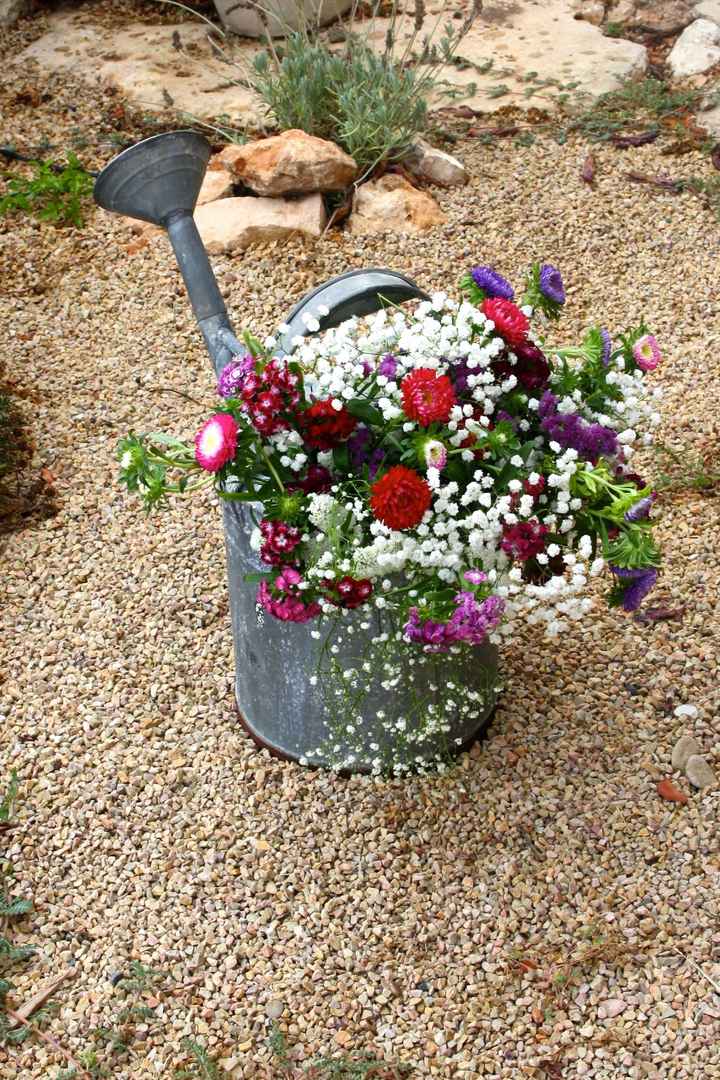 Una Regadera de Florero