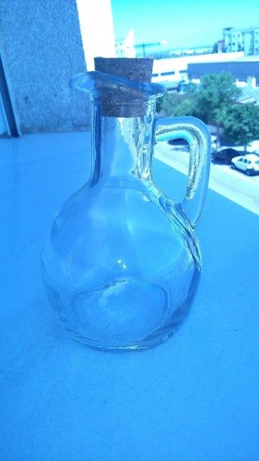 Botellita de aceite para mujeres