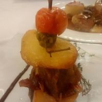 Pluma ibérica con lasca de jamón en milhoja