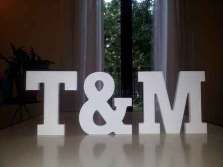 T & M