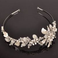 Busco diadema.tiara, tema florales en plata ¿me ayudais? - 6
