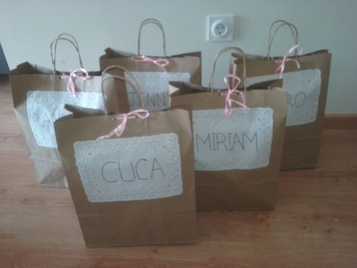 Bolsa con su nombre y un lacito rosa para cerrarlas