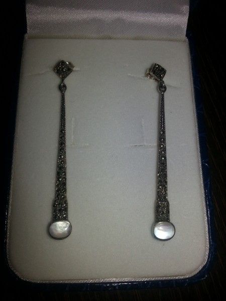 Os gustan?pendientes y peina - 1