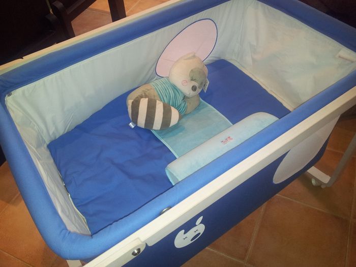 minicuna con el cojin antivuelco