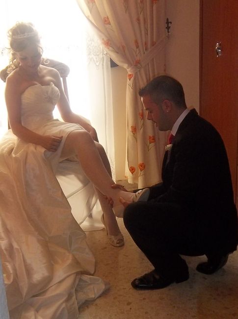 Mi padrino, poniedome los zapatos
