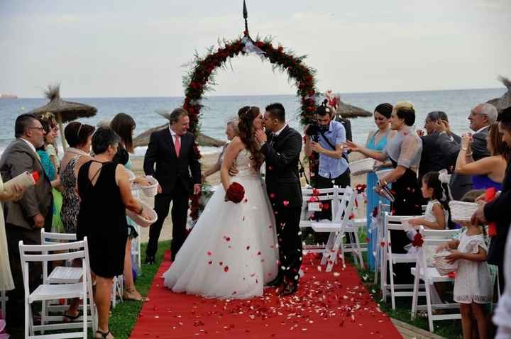 Beso crónica de boda