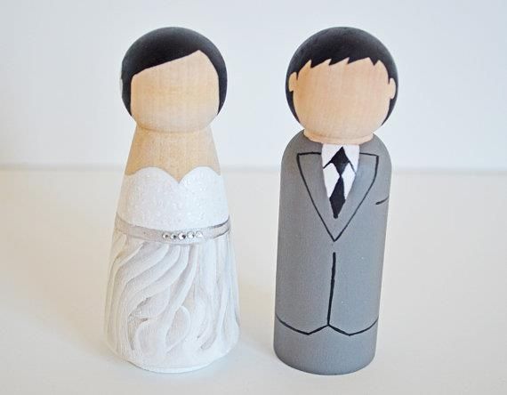 novios de madera