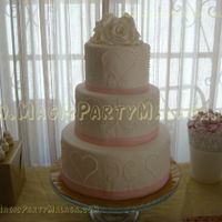 Tarta rosa y blanca