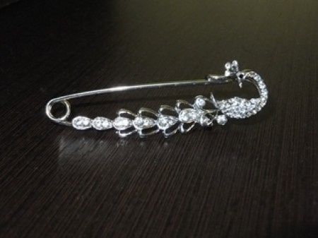 Broche cola