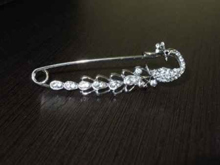 Broche cola
