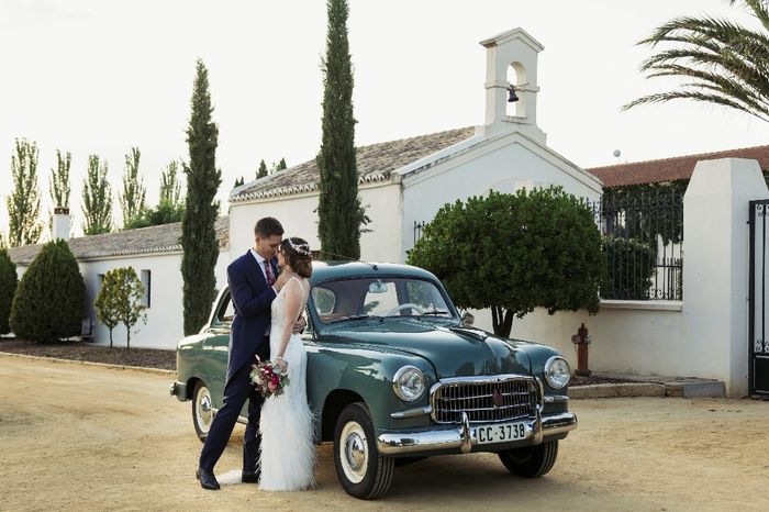 Con el coche de la llegada