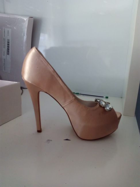 https://www.milanoo.com/product/silver-wedding-shoes-platform-peep-toe-rhinestone-slip-on-high-heel-
