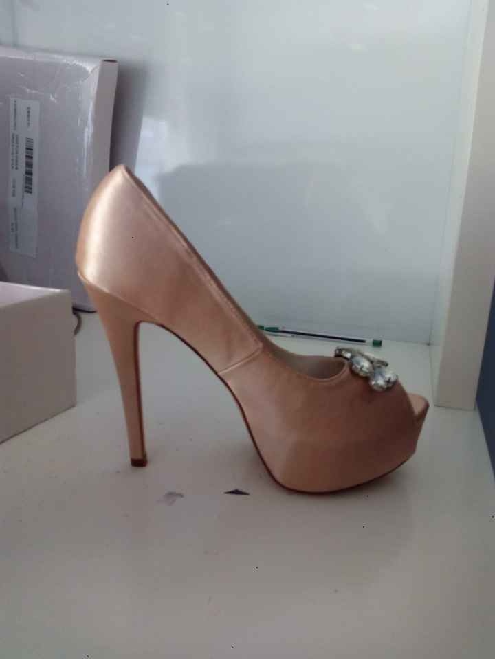 https://www.milanoo.com/product/silver-wedding-shoes-platform-peep-toe-rhinestone-slip-on-high-heel-