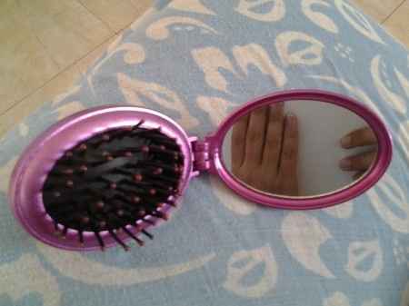 mis espejos abiertos con el cepillo