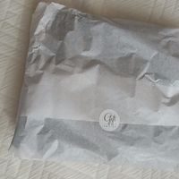 pasmina envuelta en papel de seda