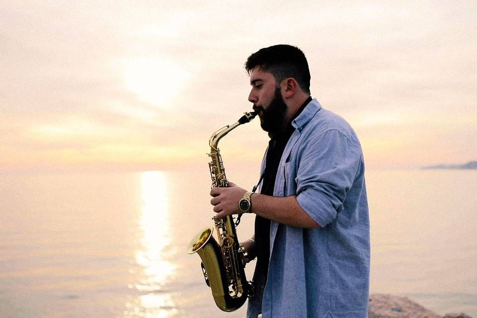Saxofónista playa Granada