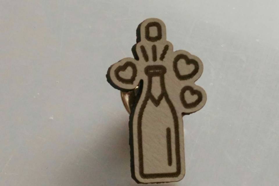 Pin de botella de champán