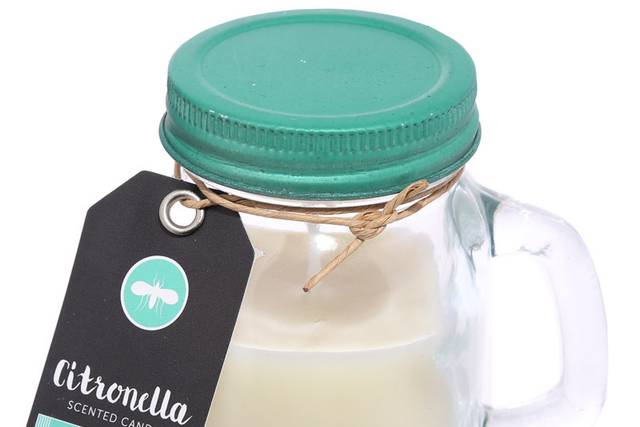 Vela citronella en jarra
