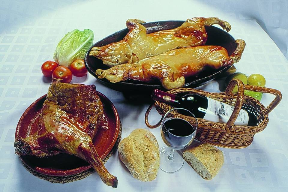 Cordero y Cochinillo asados en horno de leña