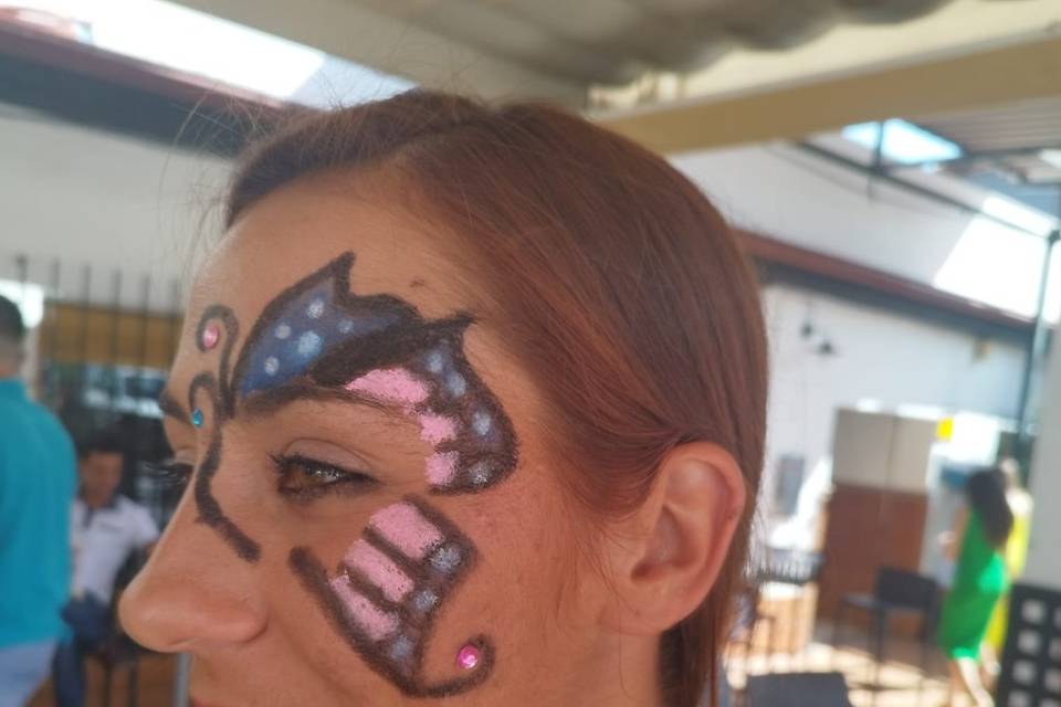 Mariposa a media cara