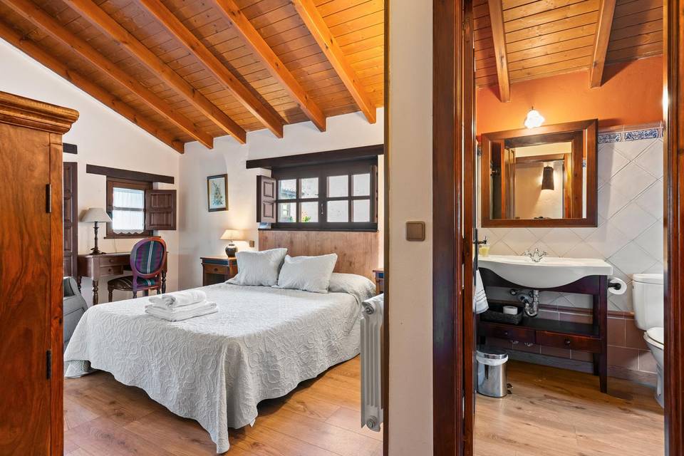 Dormitorio con baño el Bosque