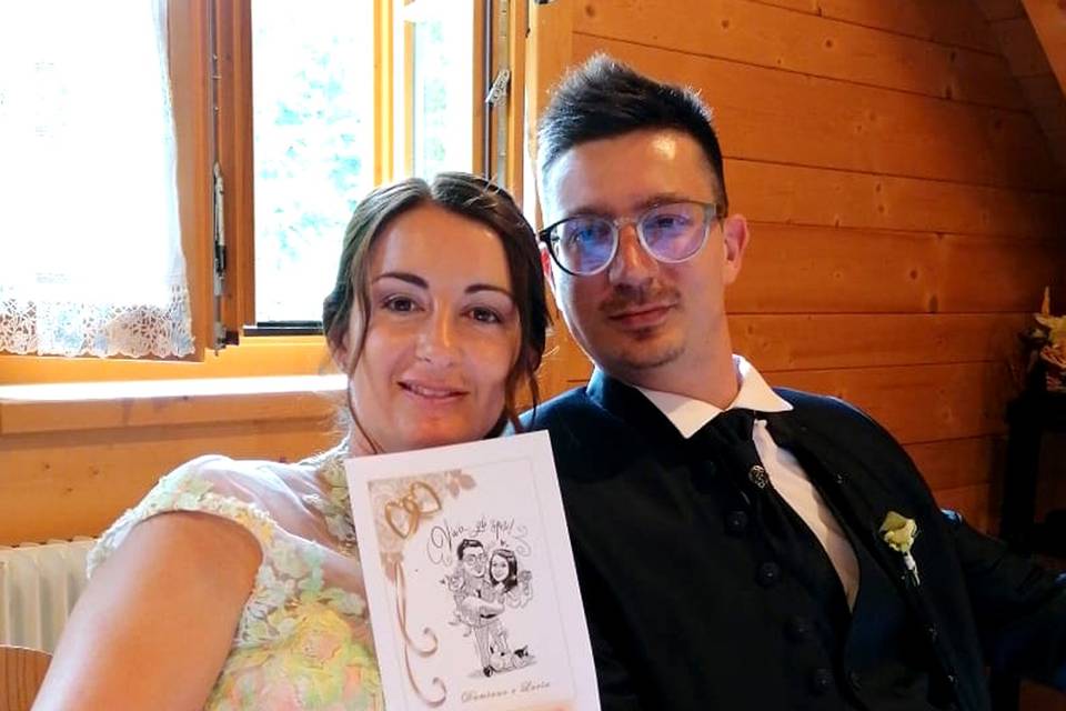 Novios con sus caricaturas