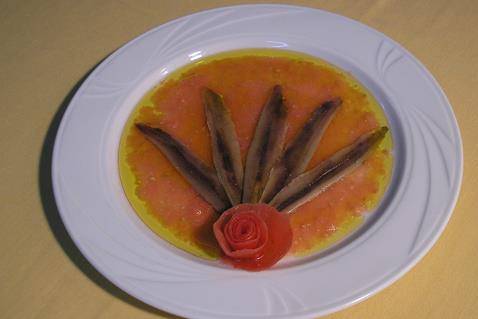 Anchoas del Cantábrico con tomate natural