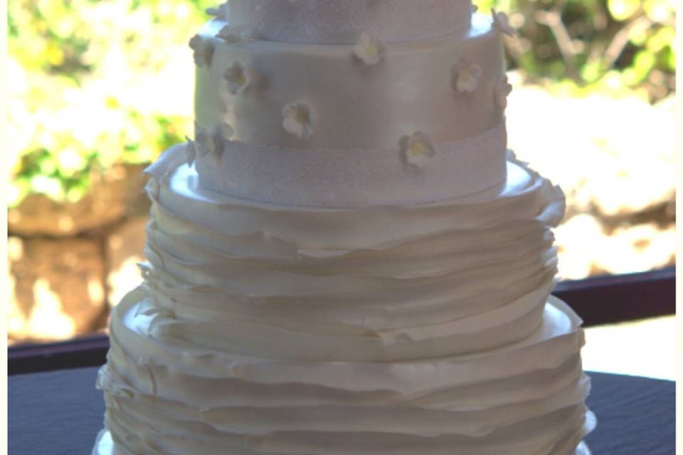 White blooms wedding cake