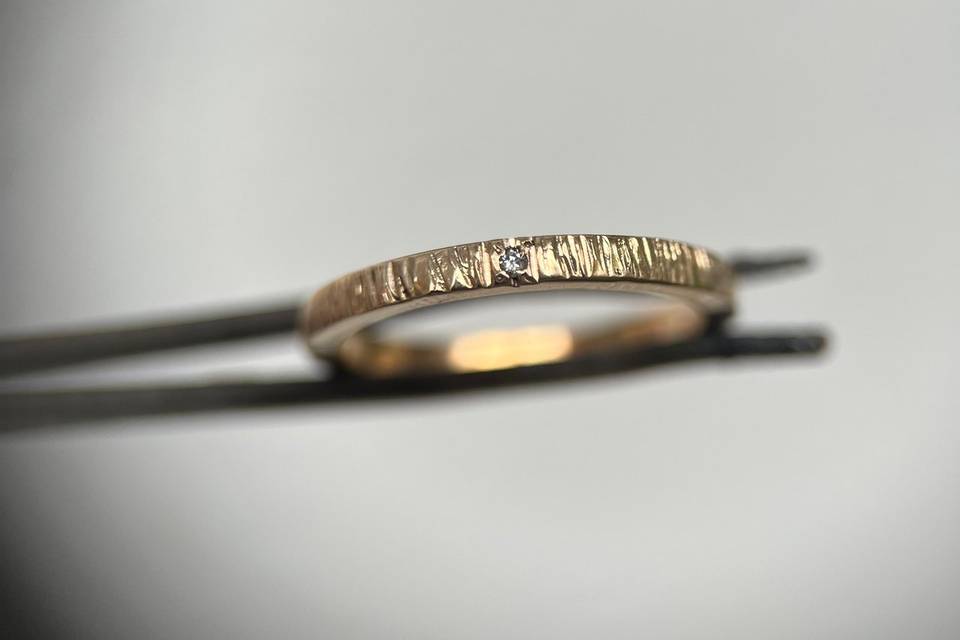 Alianza oro, martillada