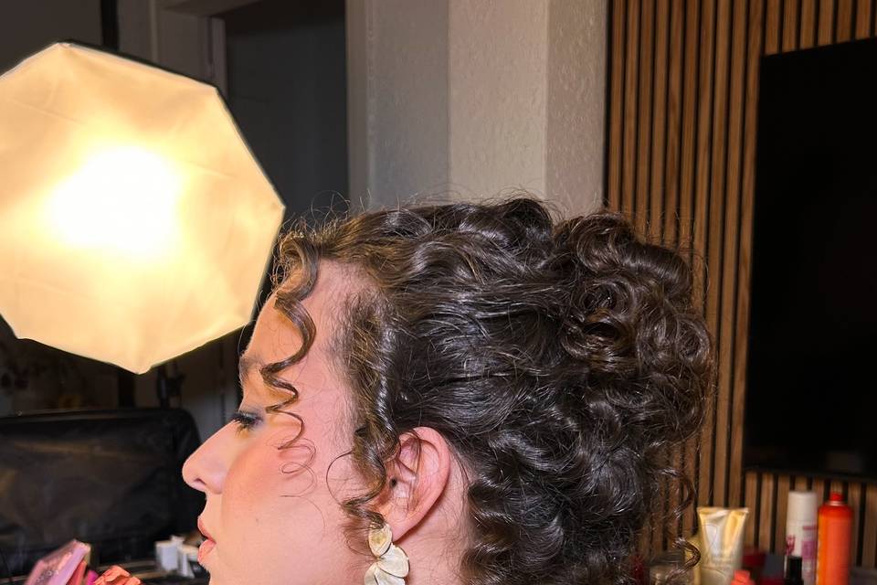Moño pelo rizado