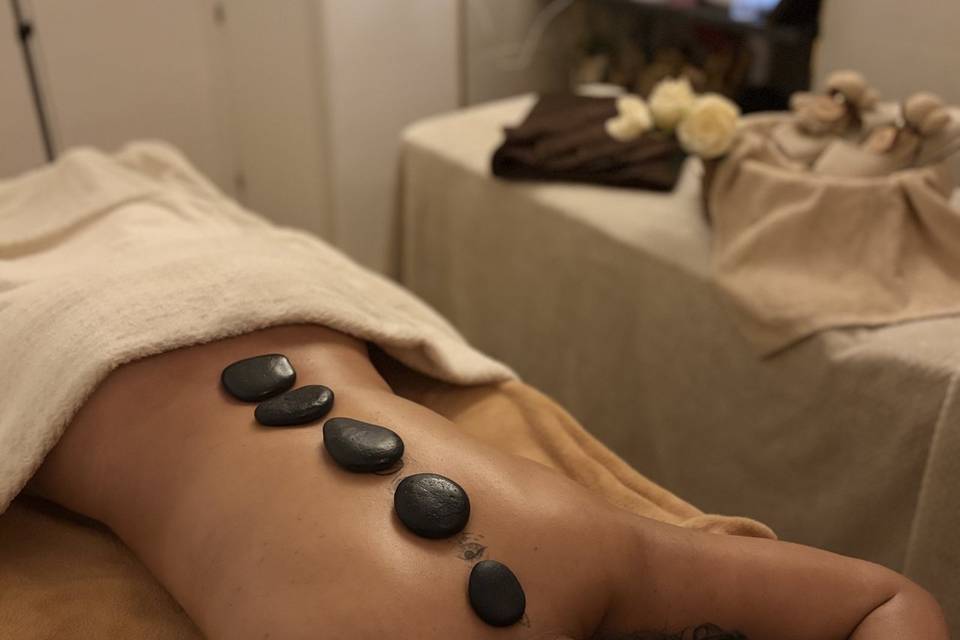Masaje piedras calientes