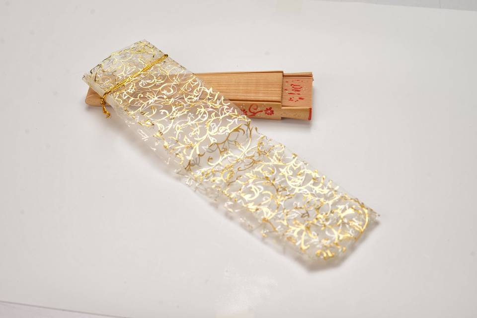 Funda de organza color oro