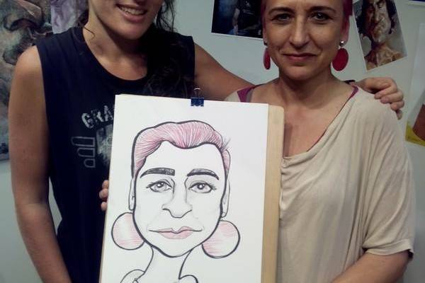 Caricaturista y caricaturizada