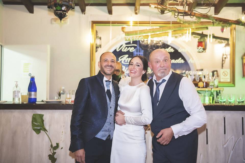 Los novios y el padrino