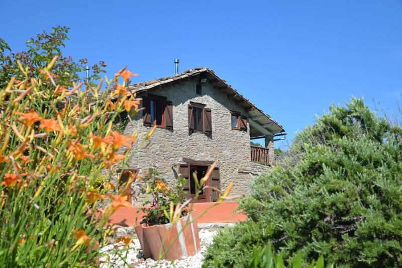 Vista casa desde el jardín