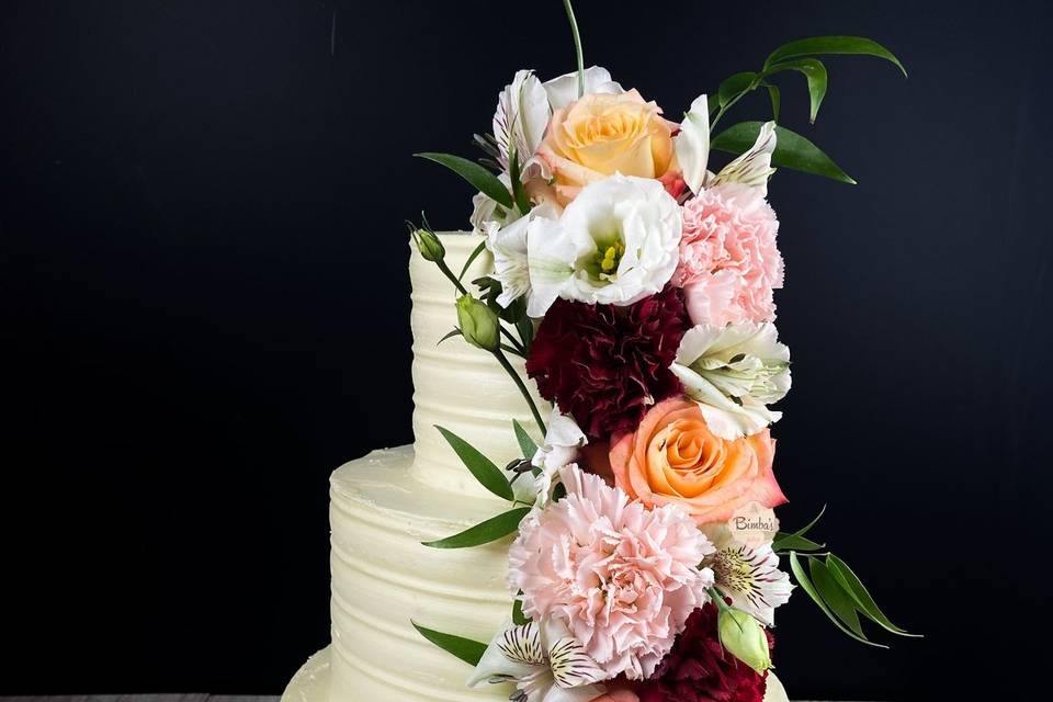 Tarta blanca cascada flor