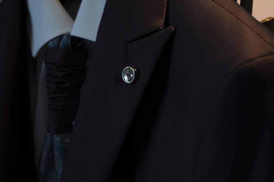 Detalles traje