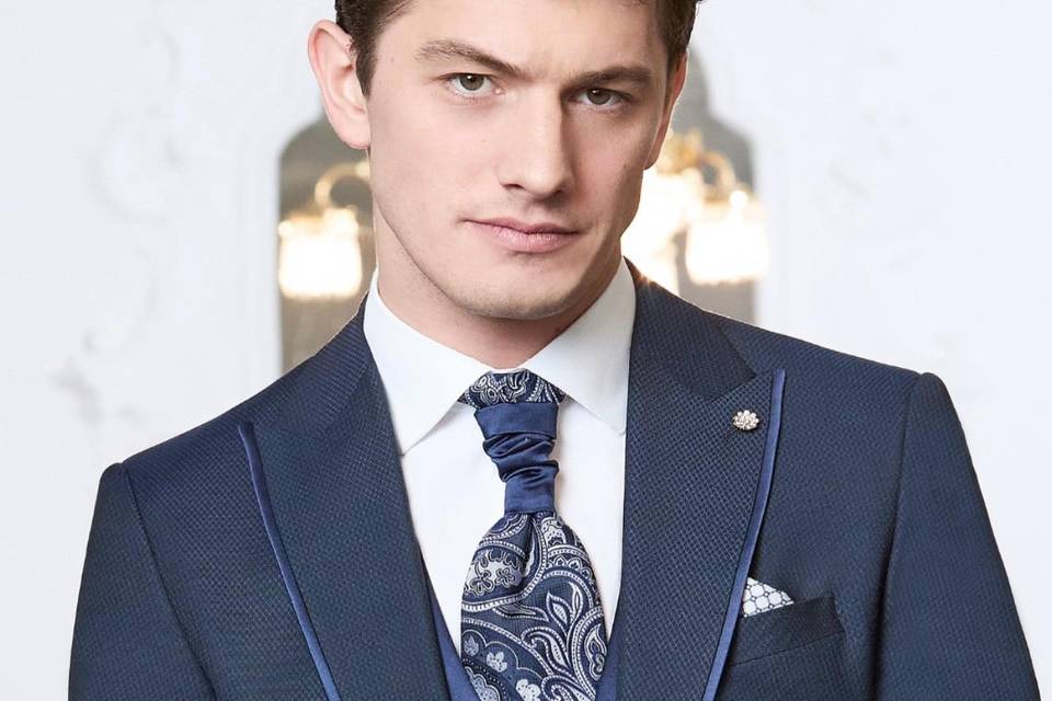 Traje, corbata y chaqué